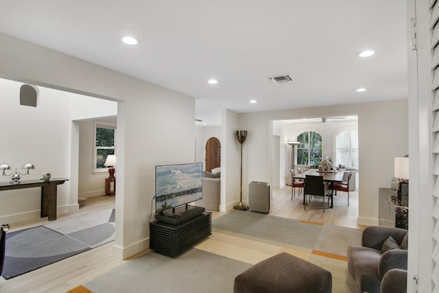 living room with light hardwood / wood-style flooring