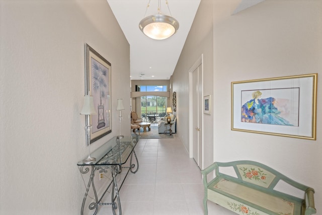 hallway featuring light tile patterned floors