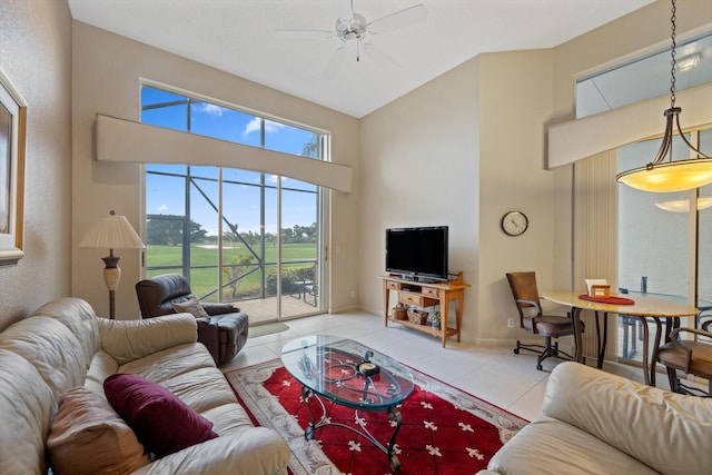 living room with light tile patterned floors and ceiling fan