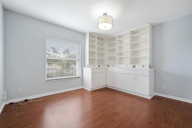 interior space with dark hardwood / wood-style floors