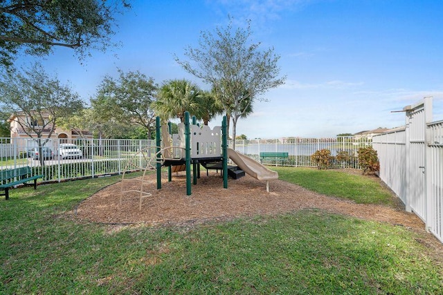 view of playground with a yard