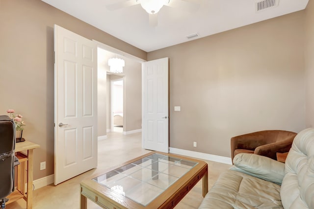 living room with ceiling fan