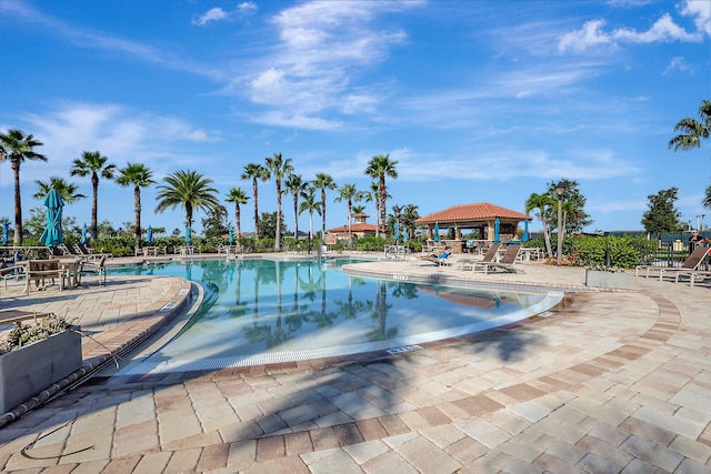 view of swimming pool featuring a gazebo and a patio area