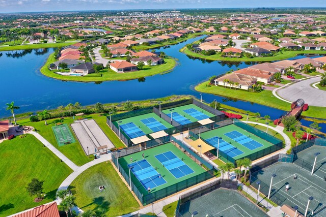 bird's eye view with a water view