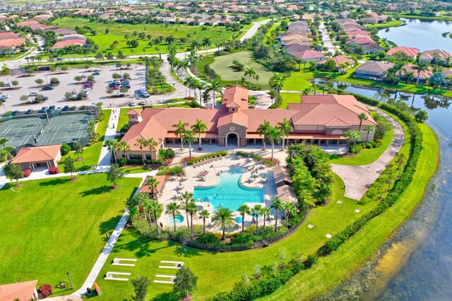 birds eye view of property featuring a water view