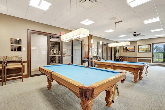 recreation room with ceiling fan, pool table, and light colored carpet