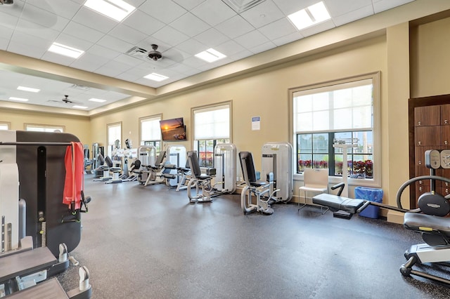 exercise room featuring a drop ceiling