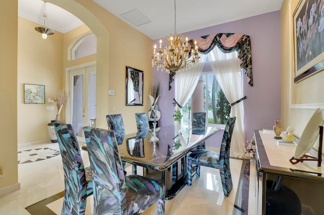 home office featuring french doors, ornamental molding, a notable chandelier, and light tile patterned flooring