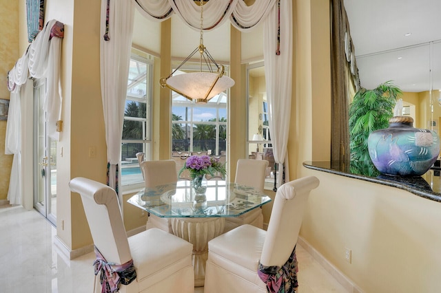 dining area featuring a healthy amount of sunlight