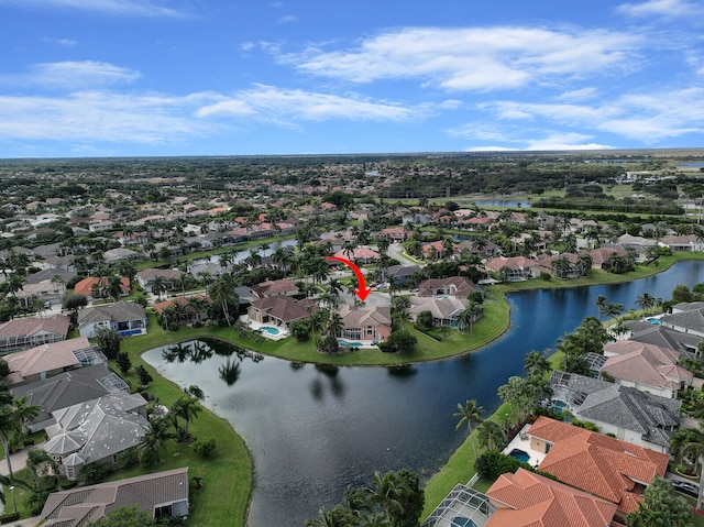 drone / aerial view with a water view