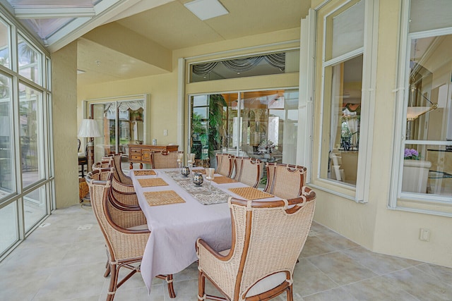 dining space with light tile patterned floors