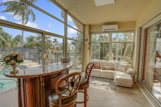 sunroom / solarium featuring a wall mounted air conditioner