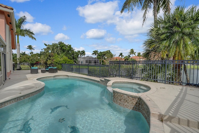 view of swimming pool featuring an in ground hot tub, outdoor lounge area, and a patio area