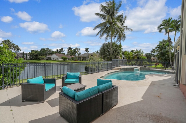 view of swimming pool with a patio area and a water view