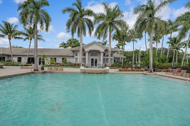 view of swimming pool featuring a patio area