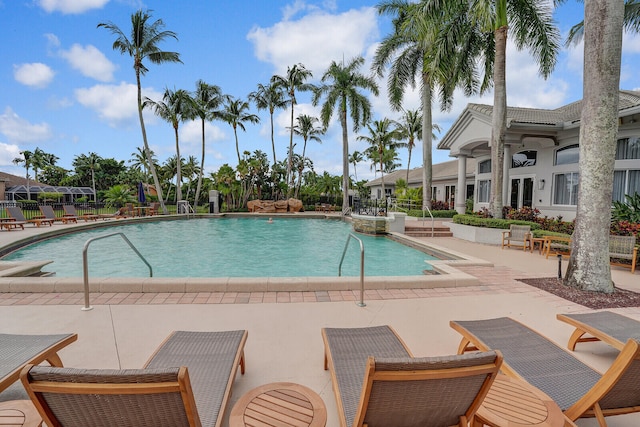 view of pool featuring a patio