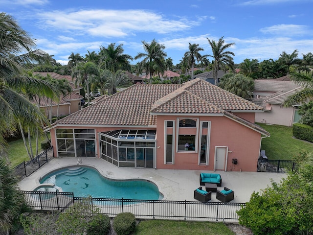 view of pool with a patio area and an outdoor living space