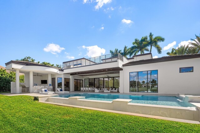 back of house featuring ceiling fan, an outdoor living space, a balcony, area for grilling, and a patio