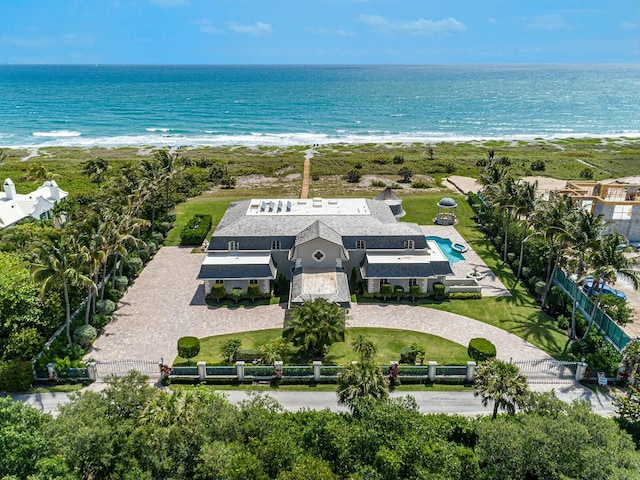 aerial view with a view of the beach and a water view