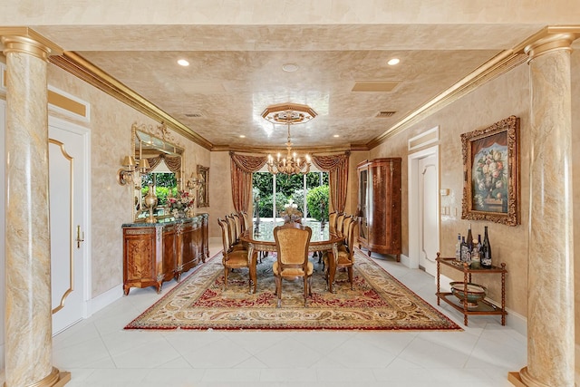 dining room featuring a notable chandelier, ornamental molding, and decorative columns