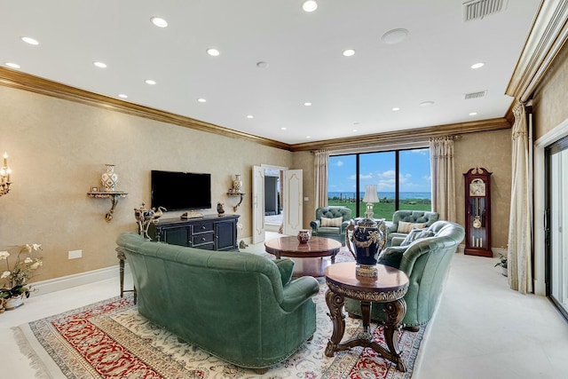 living room featuring crown molding