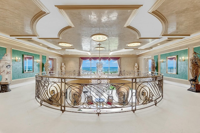 corridor with plenty of natural light, coffered ceiling, and ornamental molding