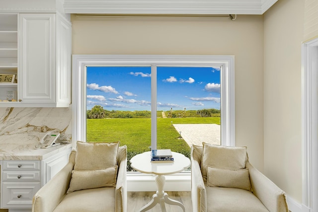 sitting room with hardwood / wood-style floors