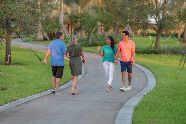 view of community featuring a yard