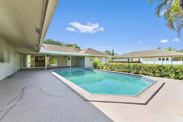 view of pool featuring a patio