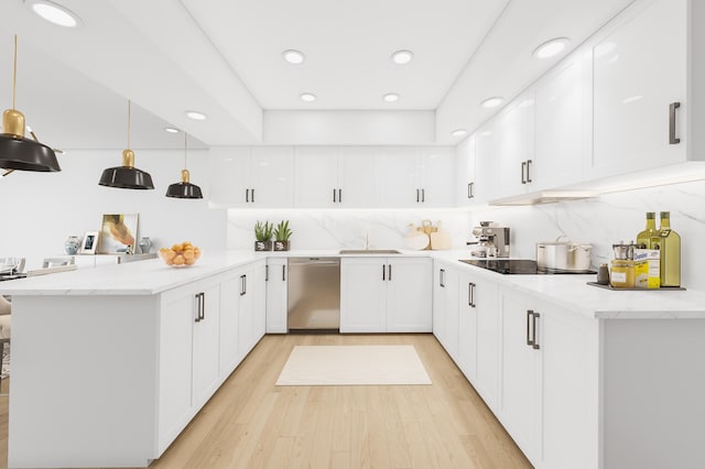 kitchen with kitchen peninsula, dishwasher, decorative light fixtures, white cabinetry, and black electric stovetop