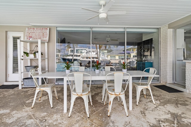 exterior space with ceiling fan