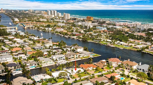 drone / aerial view featuring a water view