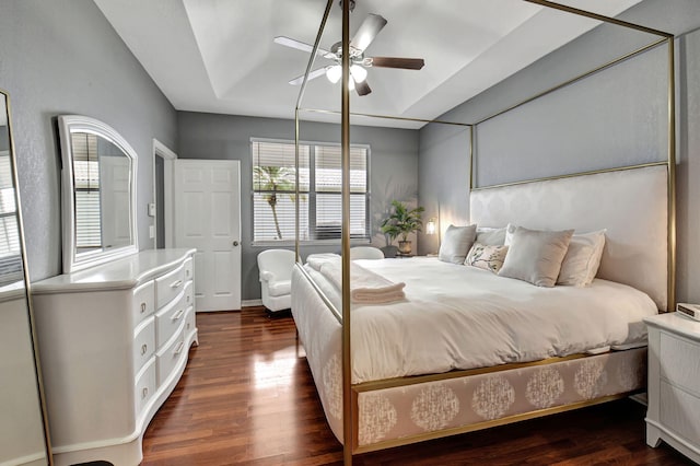 bedroom featuring ceiling fan and dark wood-type flooring