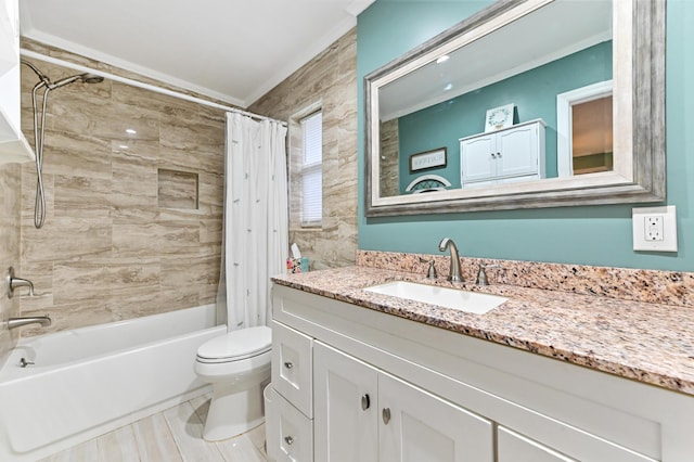 full bathroom featuring vanity, toilet, crown molding, and shower / bath combo with shower curtain