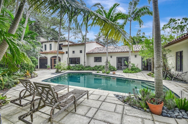 view of swimming pool featuring a patio