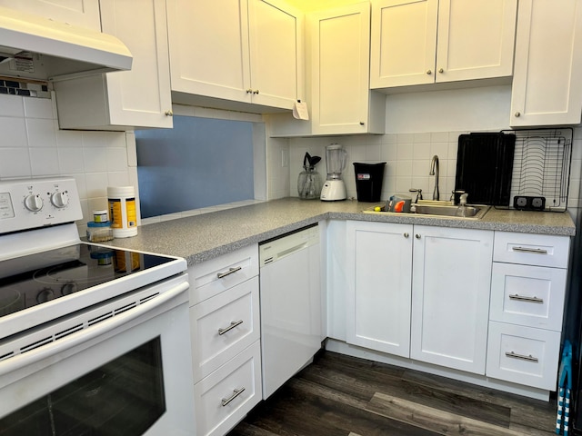 kitchen featuring sink, dark wood-type flooring, tasteful backsplash, white appliances, and white cabinets