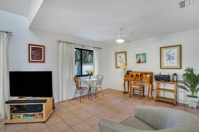 living room with tile patterned floors and ceiling fan