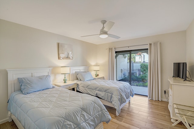 bedroom with ceiling fan, light wood-type flooring, and access to outside