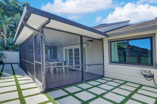 view of patio / terrace with a sunroom