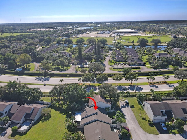 birds eye view of property featuring a water view