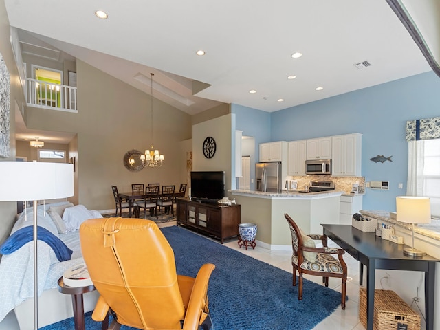 living room with sink, light tile patterned floors, vaulted ceiling, and a notable chandelier