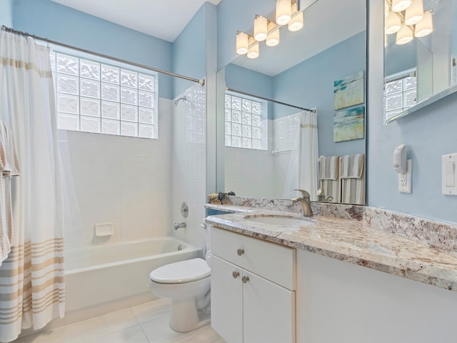 full bathroom with tile patterned flooring, vanity, toilet, and shower / tub combo with curtain