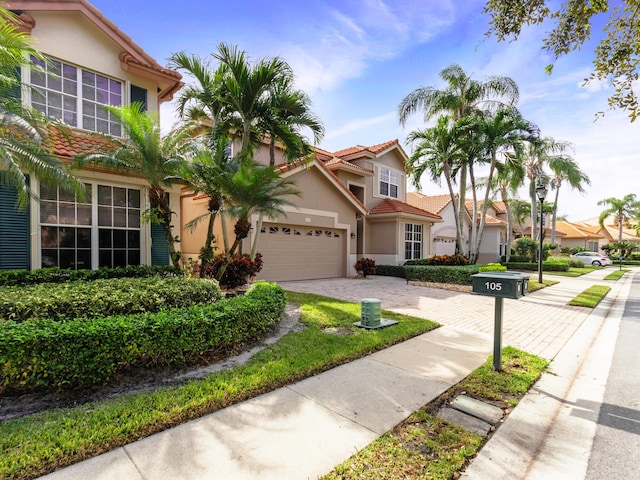 view of front of property featuring a garage