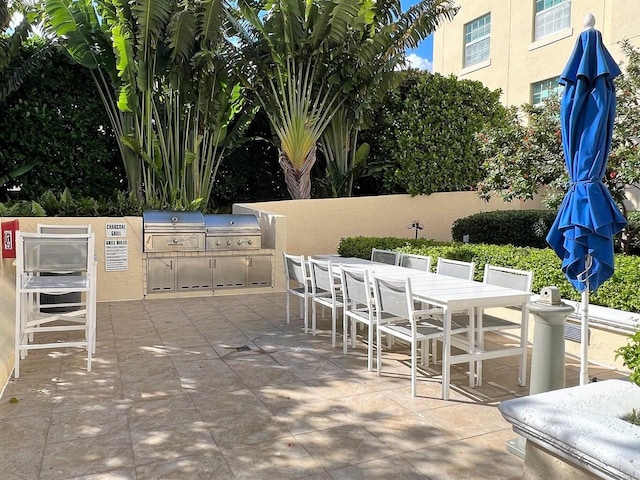 view of patio / terrace featuring area for grilling and an outdoor kitchen