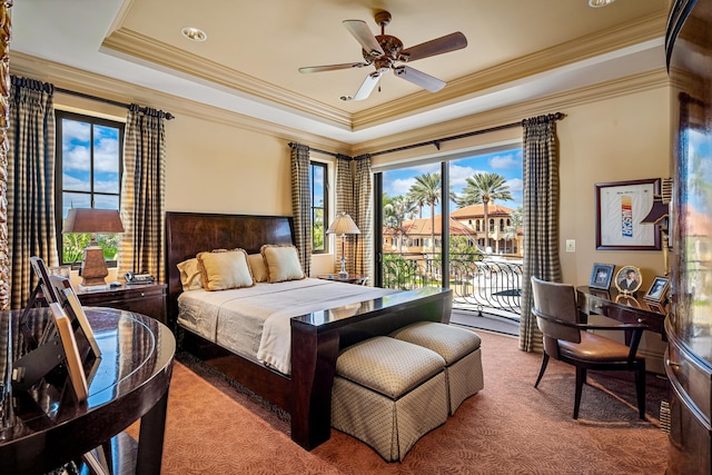 bedroom featuring access to exterior, a raised ceiling, ceiling fan, and crown molding