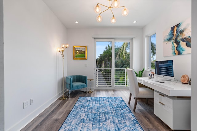 office featuring a chandelier and dark wood-type flooring