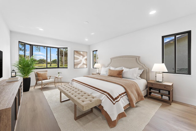 bedroom featuring light hardwood / wood-style floors