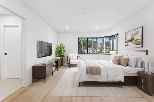 bedroom featuring light wood-type flooring