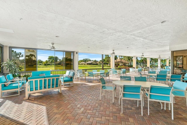 view of patio / terrace featuring outdoor lounge area and ceiling fan