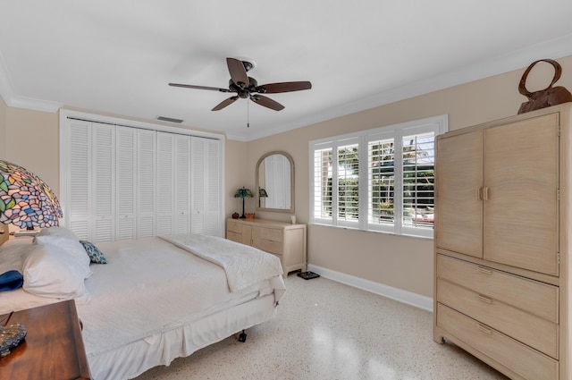 bedroom featuring ceiling fan and crown molding